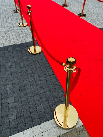 Imagine a luxurious red carpet pathway lined with elegant gold stanchions, creating a grand entrance...
