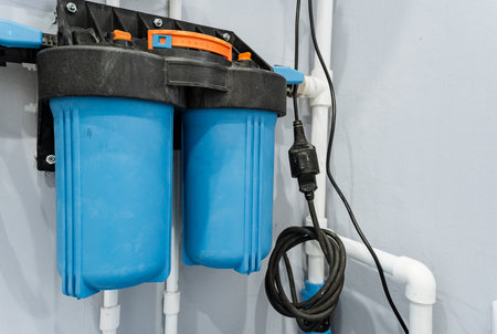 dual wallmounted filters with indicators, installed dual water filters with indicator displaysの写真素材