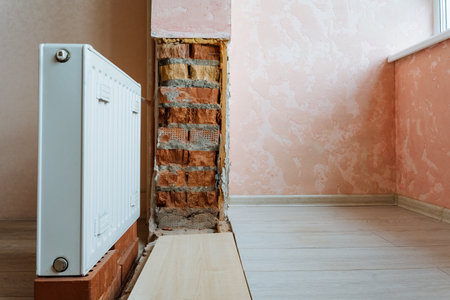 stylish renovated corner, modern room corner renovation, contemporary space with exposed brickの写真素材