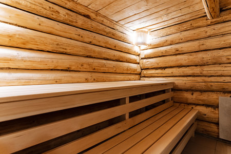 tranquil wooden sauna with warm lighting, peaceful spa setting featuring warm wooden sauna ambiance, calm and serene spa scene emphasizing warm lighting and soothing wooden saunaの写真素材