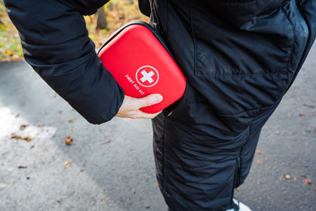 Prepared safety gear, Trail competitor carrying essential first aid and safety equipment,...