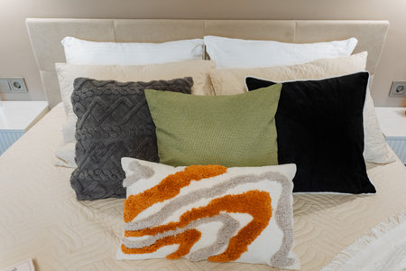 bold textured patterned bedding, vibrant decorative pillows with mixed textures for bedroom charm,...