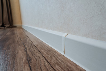 sophisticated interior molding featuring smooth joints and rich wood hues, refined interior trim...