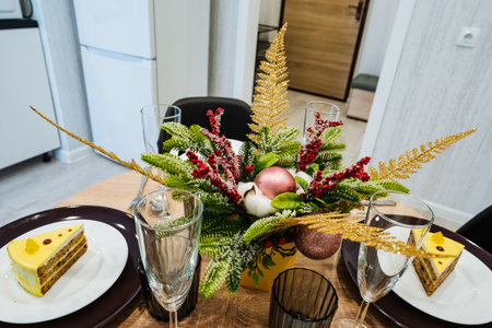 Decorative Dining Arrangement With Elegant Flowers And Delicious Desserts, Sophisticated Table Presentation Showcasing Floral Decorations And Tasty Confections For Special Occasionsの写真素材