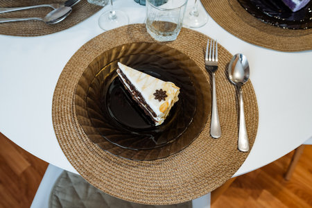 Desserts Display With Utensil, Cozy Indoor Scene Featuring Cake On Woven Mat And Glass Plate, Home...