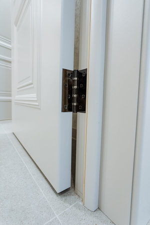 Checked Hinge And Frame Thoroughly. Final Review Of Hinge Fittings Completed Now. Assessment Of Hinge And Frame Fittings Concludes After Comprehensive Inspection During Repair Processの写真素材