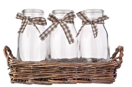 empty milk bottle in the basketの写真素材