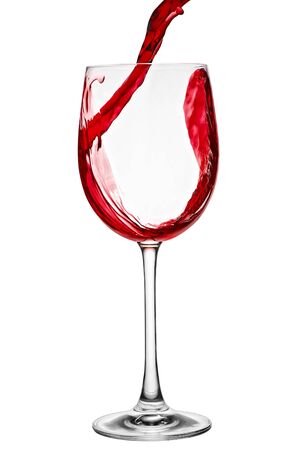 Red wine pouring into wine glass の写真素材
