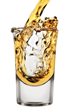 whiskey being poured into a glassの写真素材