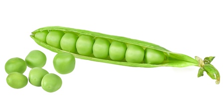 fresh green peas isolated on whiteの写真素材