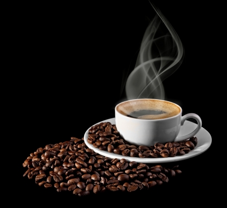 cup of coffee with grains on a black background の写真素材