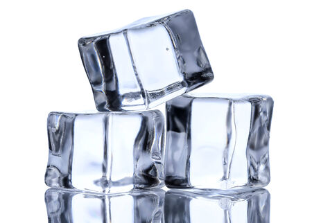 Three ice cubes on white backgroundの写真素材