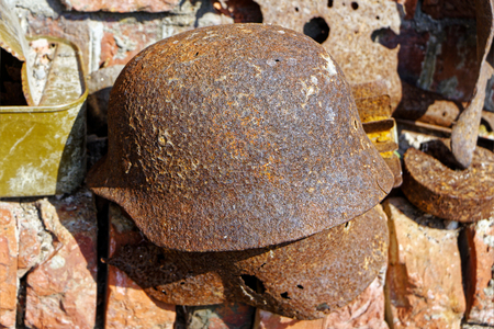 Old rusty German helmet of times of World War IIの写真素材