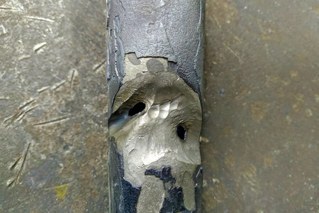 Metal pipe corrupted by high pressure steamの写真素材