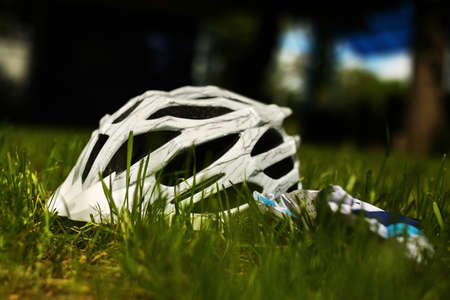 Bicycle helmet and cycle gloves isolated on white backgroundの写真素材