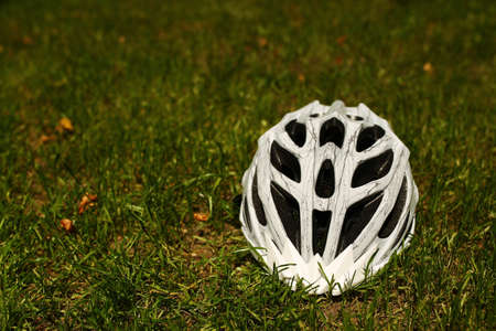 Bicycle helmet and cycle gloves isolated on white backgroundの写真素材