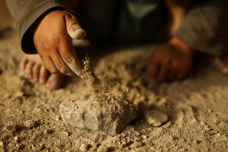 alone sad child playing on a streetの写真素材