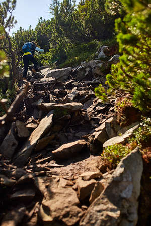 trail running woman runner at great wall on the top of mountain.の写真素材