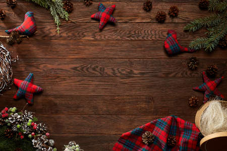 Christmas decoration frame on dark wooden background.の写真素材