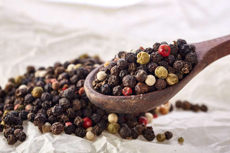 black pepper peas on a wooden spoon