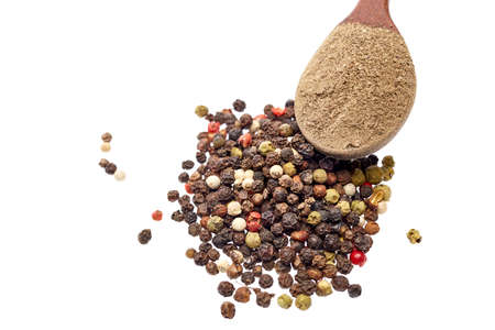 Wooden spoon full of paprica isolated on white background, close-up, top view, shallow depth of fieldの写真素材