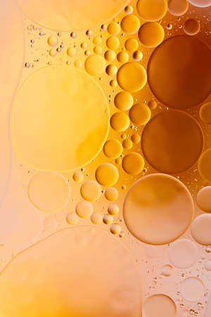oil drops on a water surface abstract backgroundの写真素材