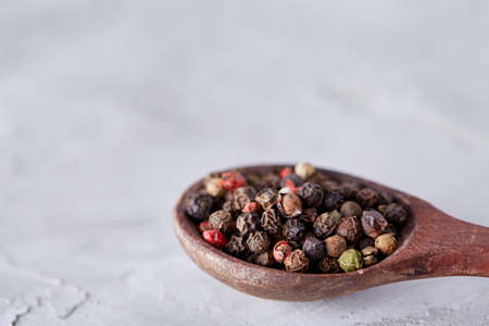 Seasoning - four kinds of pepper peas - isolated on white backgroundの写真素材