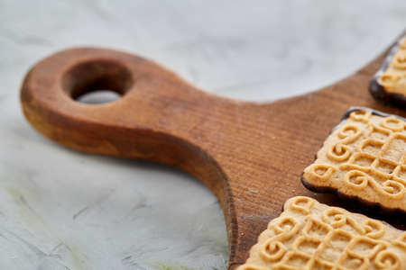 Top view close-up picture of tasty cookies on the cutting board, shallow depth of field, selective focusの写真素材