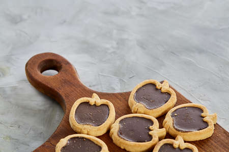 Top view close-up picture of tasty cookies on the cutting board, shallow depth of field, selective focusの写真素材