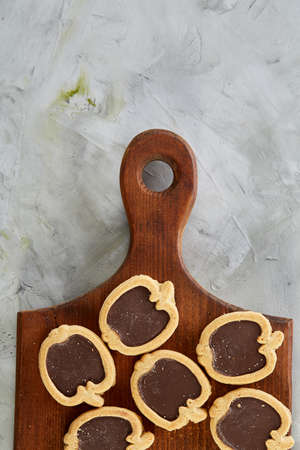 Top view close-up picture of tasty cookies on the cutting board, shallow depth of field, selective focusの写真素材