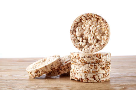 Stack of crispbreads on light wooden table