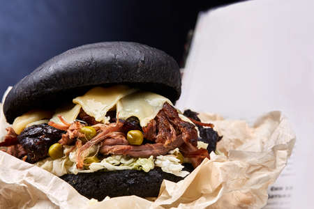 Close-up of delicious fresh home made burger on a white background, shallow depth of field, selective focus.の写真素材