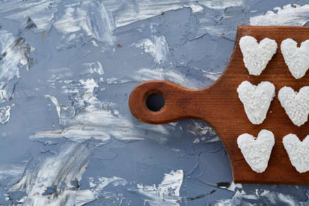 Top view close-up picture of tasty cookies on the cutting board, shallow depth of field, selective focusの写真素材