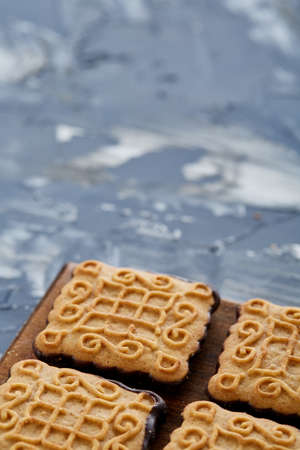 Top view close-up picture of tasty cookies on the cutting board, shallow depth of field, selective focusの写真素材
