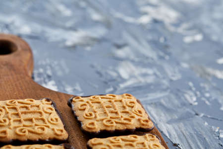 Top view close-up picture of tasty cookies on the cutting board, shallow depth of field, selective focusの写真素材