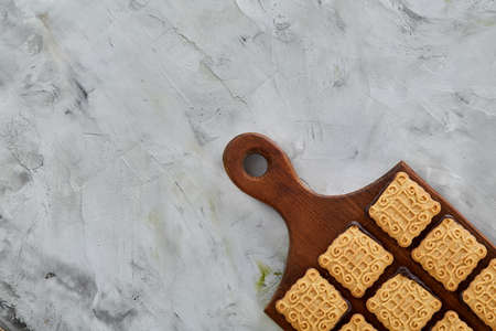 Top view close-up picture of tasty cookies on the cutting board, shallow depth of field, selective focusの写真素材