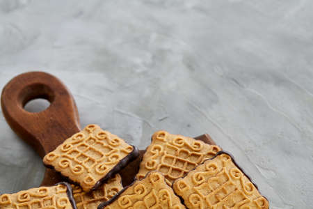Top view close-up picture of tasty cookies on the cutting board, shallow depth of field, selective focusの写真素材