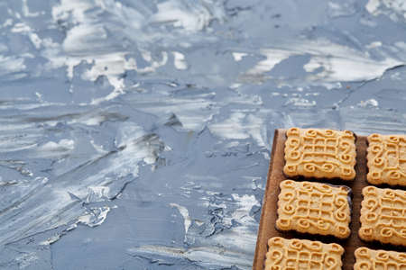 Top view close-up picture of tasty cookies on the cutting board, shallow depth of field, selective focusの写真素材