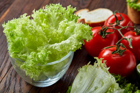 Lunch sandwich with cheese and vegetables served with citrus and coffee, selective focus, close-up, top viewの写真素材