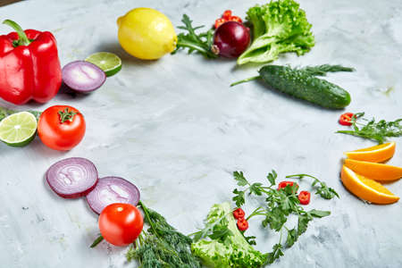 Frame made of fruits and vegetables on white background, copy space, selective focus, flat lay, close-upの写真素材