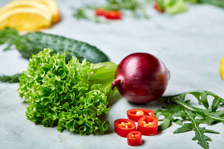 Composition of vegetables and herbs on white background, copy space, selective focus, flat lay, close-upの写真素材
