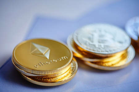 Bitcoin cryptocurrency on the chart background, close-up, shallow depth of field