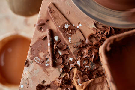 Red clay shavings background, top view, close-up, shallow depth of fieldの写真素材