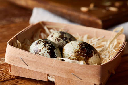 Preparation for making healthy salad with quail eggs, top view, close-up, selective focus