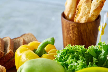 Ingredients for school lunch and plastic container on the table, close-up, selective focusの写真素材