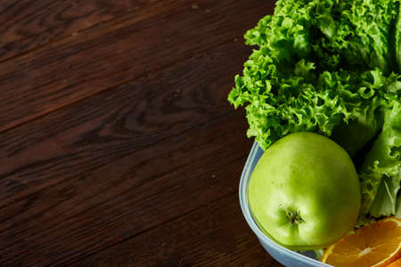 Healthy lunch prepared in small plastic container, top view, close-up.の写真素材