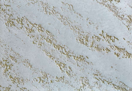 White plastered wall background with abstract pattern, close-up, macro. Open space for text,...
