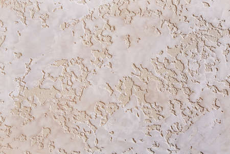 Beige rough wall textured background. Abstact stucco. Texture of plaster on the wall. Macro, high...