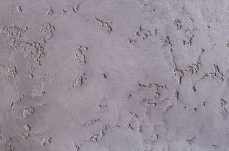 White plastered wall background with abstract pattern, close-up, macro. Open space for text,...
