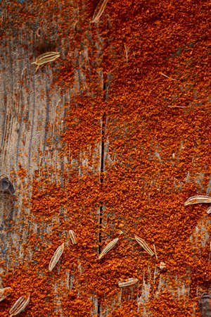 Grind paprica colorful background, close-up, shallow depth of field. Some copy space for inscription...